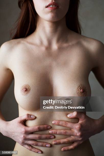 woman's body - weibliche brust stock-fotos und bilder