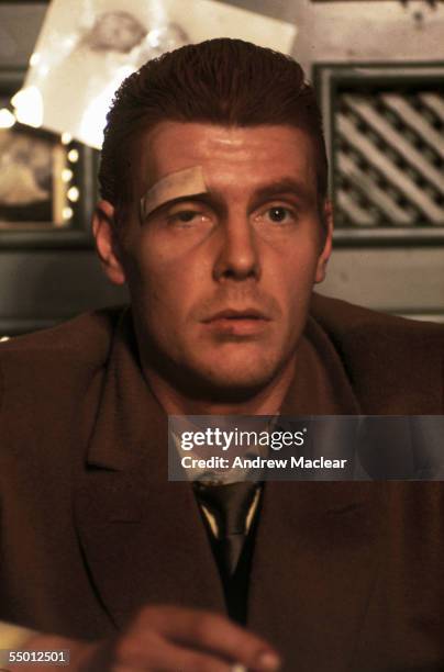 James Fox as London gangster, Chas on the set of Donald Cammell and Nicolas Roeg's psychological thriller, 'Performance', 1968.