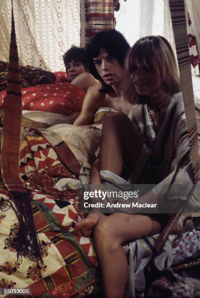 Anita Pallenberg and Mick Jagger with French actress Michele Breton on the set of Donald Cammell and Nicolas Roeg's psychological thriller,...