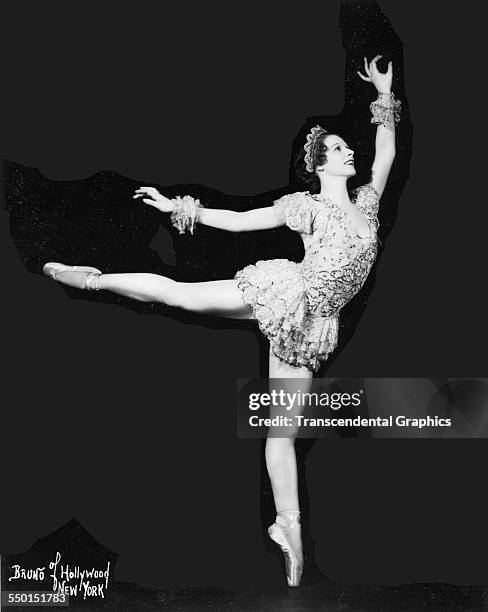 Ballerina Gloria Gilbert poses en pointe for a Bruno of Hollywood photo, Chicago, Illinois, circa 1940.