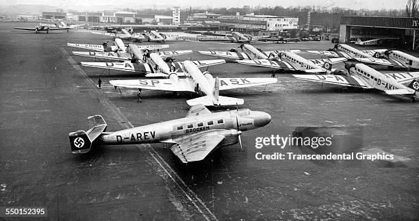 News photograph of a Nazi airport with a number of parked planes, Dusseldorf, Germany, 1938.