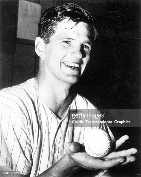 Ralph Terry, pitcher for the New York Yankees, shows off the game ball after a win at Yankee Stadium, New York, New York, 1960.