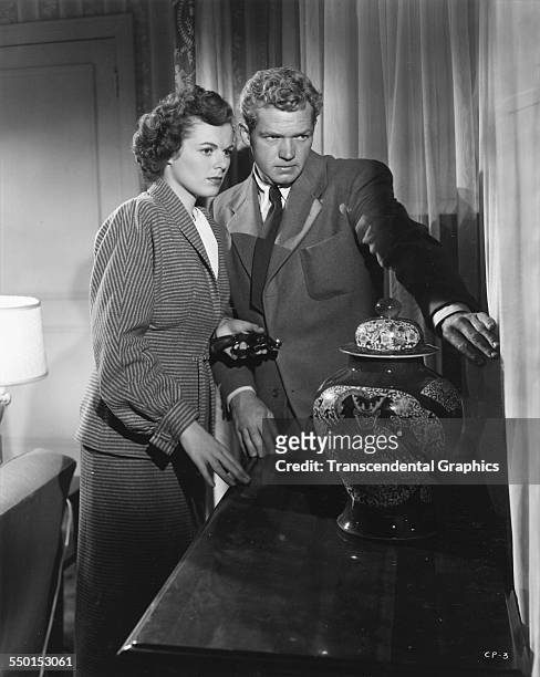 Barbara Hale and Bill Williams appear in a scene from the radio drama 'The Clay Pigeon,' Hollywood, California, 1948.