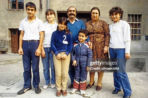 Turkish family at theiri backyard in Berlin-Kreuzberg