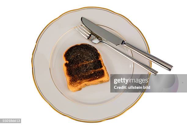 Toastbrot wurde beim toasten verbrannt. Verbrannt Toastscheiben beim Frühstück.