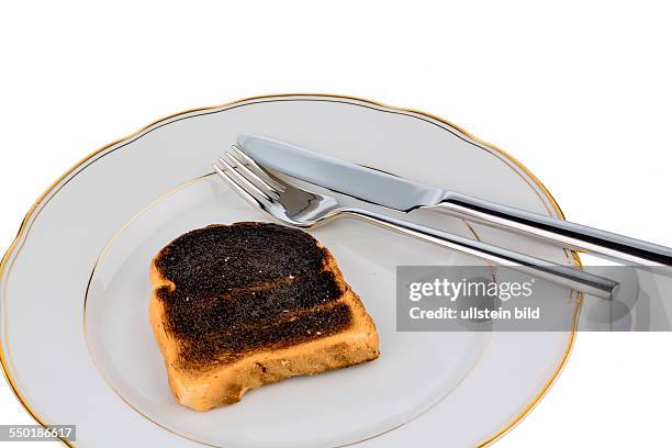 Toastbrot wurde beim toasten verbrannt. Verbrannt Toastscheiben beim Frühstück.