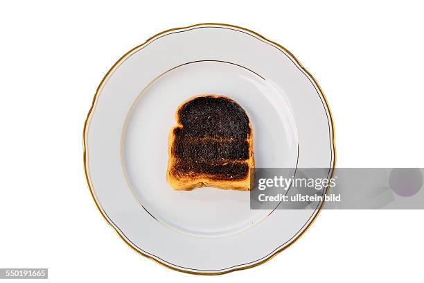 Toastbrot wurde beim toasten verbrannt. Verbrannt Toastscheiben beim Frühstück.