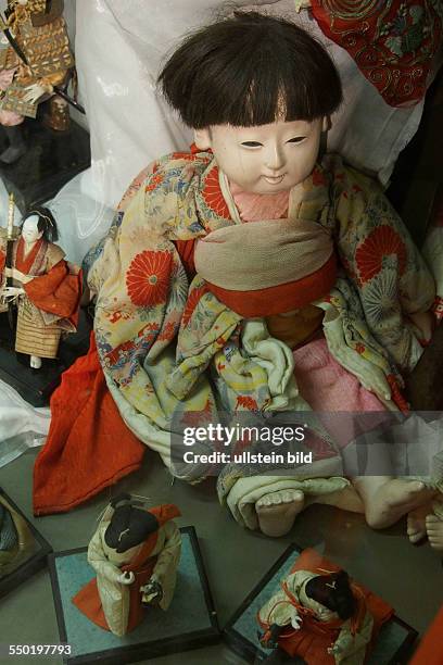 Japanese baby doll, Toy and model museum, Brighton, East Sussex, England, UK, on