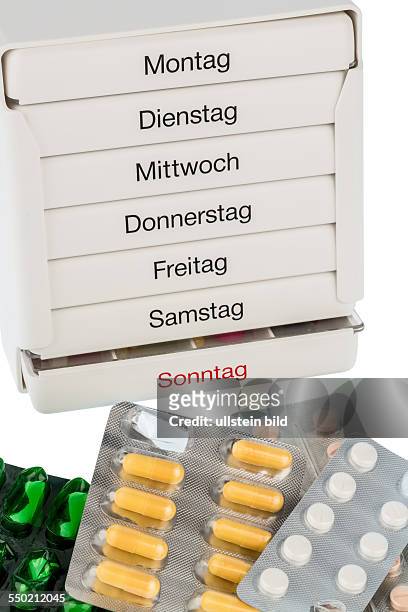 Tablettenspender, Symbolfoto für Therapie, Verordnung und Dosierung