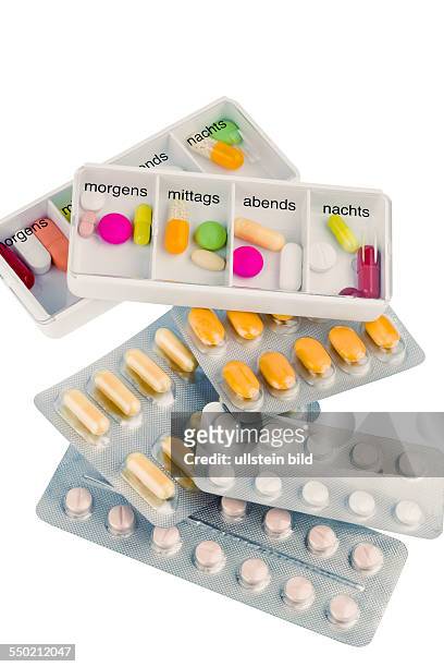 Tablettenspender, Symbolfoto für Therapie, Verordnung und Dosierung
