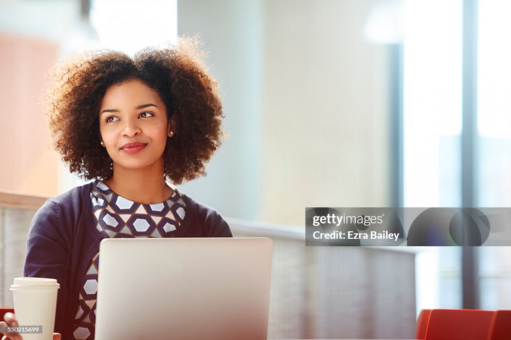 Creative businesswoman discussing plans.