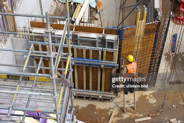 Construction site of a commercial building in downtown Bonn. Reinforcement work on the foundation