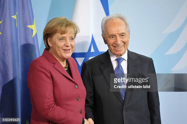 Bundeskanzlerin Angela Merkel und der israelische Präsident Shimon Peres während einer Pressekonferenz anlässlich seines Besuches in Berlin