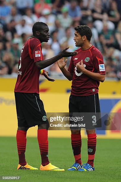 Fussball, Saison 2013-2014, 1. Bundesliga, 2. Spieltag, Borussia Moenchengladbach - Hannover 96 3-0, v.li., Salif Sane , Karim Haggui