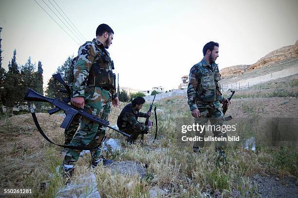 April 27 Yabrud, Rif Dimashq, Syria. A Katiba is inspecting an area often shelled by government forces in the outskirts of Yabrud. This regiment is...