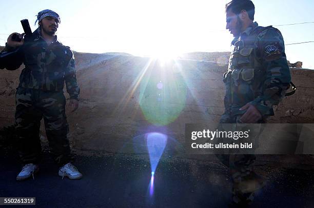 April 27 Yabrud, Rif Dimashq, Syria. A Katiba leader is leading his men on patrol on the outskirts of Yabrud. This regiment is the most famous...