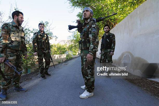 April 27 Yabrud, Rif Dimashq, Syria. A Katiba is going on patrol in the outskirts of Yabrud. This regiment is the most famous brigade in Syria...