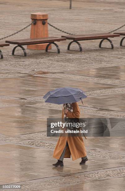 Berliner kämpfen mit dem Regenwetter