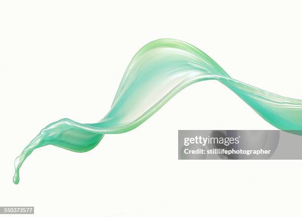 pastel green liquid splash - liquid photos et images de collection