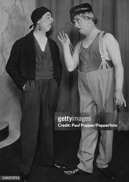 Portrait of comic actors Leslie Henson and Sydney Howard in costume, as they appear in the farce 'It's a Boy' at the Strand Theatre in London,1931.