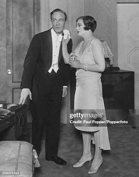 Actors Leslie Howard as Andre Sallicel and Tallulah Bankhead as Simone, rehearsing scenes for the play 'Her Cardboard Lover' at the Lyric Theatre,...