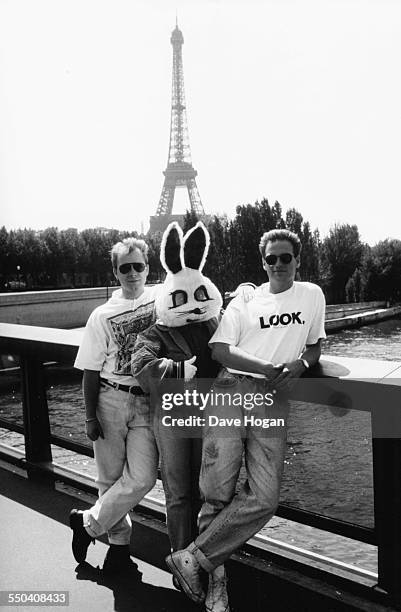 Pop band 'Jive Bunny and the Mastermixers' posing with someone in a bunny costume, Paris, circa 1985.