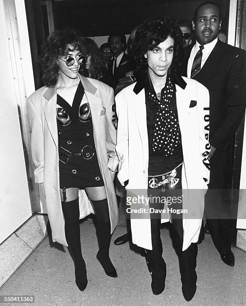 Singers Sheila E and Prince arriving for a tour of Britain, July 25th 1988.