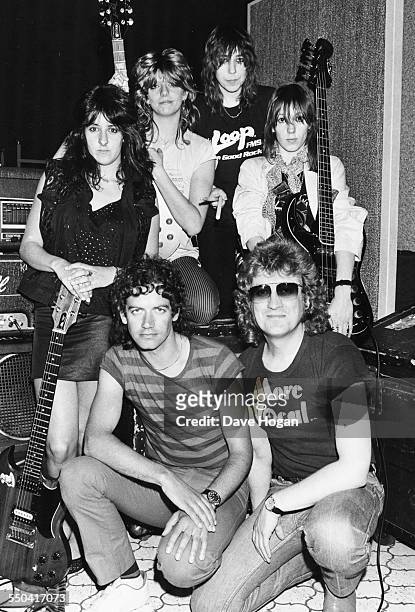 Portrait of the bands 'Slade' and 'Girlschool'; Kim McAuliffe, Jimmy Lea, Kelly Johnson, Denise Dufort, Noddy Holder and Gil Weston, at a recording...