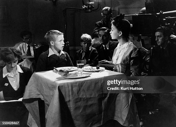 English child actor Richard Aldridge with actress Jean Simmons during a screen test for the role of the young Pip in Lean's film adaptation of...