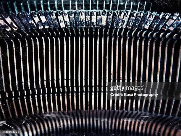 close up of an old typewriter typebars - scriptwriter stock-fotos und bilder