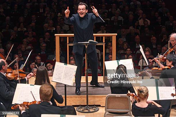 Andris Nelsons leading the Boston Symphony Orchestra in Mahler's "Symphony No. 6" on Friday night, April 17, 2015.
