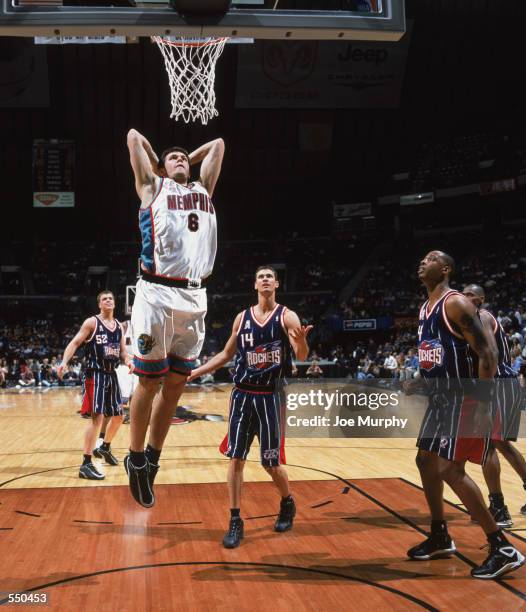 Antonis Fotsis of the Memphis Grizzlies makes a slam dunk during the game against the Houston Rockets at The Pyramid in Memphis, Tennessee. The...
