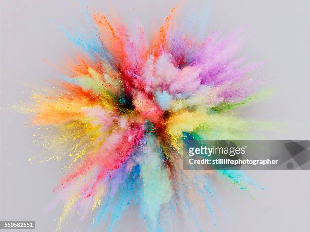 colorful powder explosion - levendige kleur stockfoto's en -beelden
