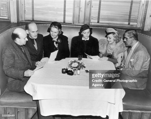 British actress Madeleine Carroll with fellow film stars at a charity lunch at Chasen's Restaurant, Beverly Hills, California, circa 1935. Left to...