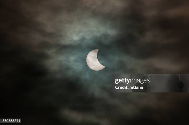 partial solar eclipse - incomplete stock pictures, royalty-free photos & images