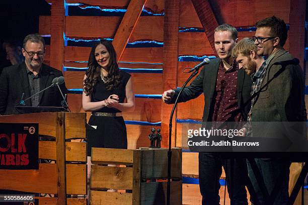 Presenters Mark Radcliffe and Julie Fowlis, with The Young 'Uns, winners of the award for Best Group, at the 16th annual BBC Radio 2 Folk Awards, at...