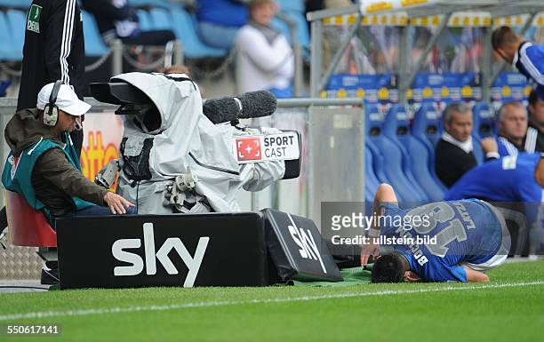 Fussball, Saison 2013-2014, 2. Bundesliga, 8. Spieltag, VfL Bochum - VfR Aalen 1-2, Danny Latza verletzt sich nach einem Zusammenprall mit der TV...