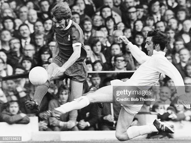 Leeds United vs Liverpool; Norman Hunter of Leeds United tackles Liverpool striker Steve Heighway during the match at Elland Road in Leeds,...