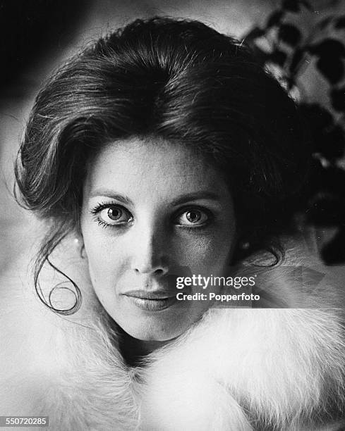 Headshot of American actress Gayle Hunnicutt wearing a fur lined collar, circa 1970.