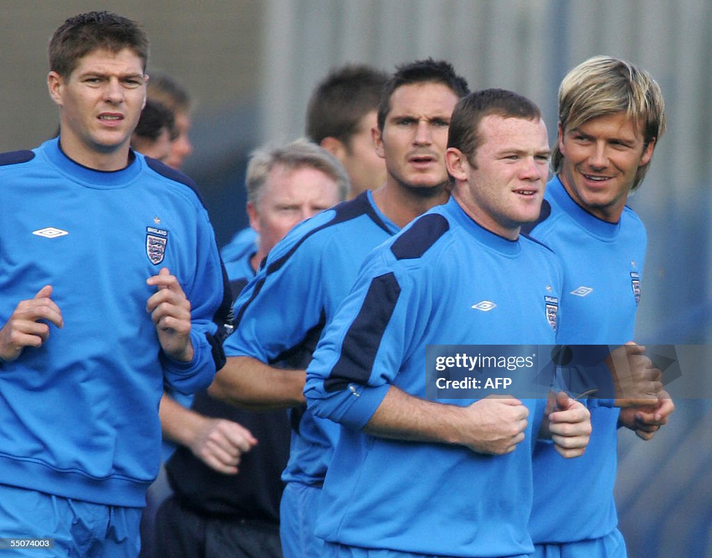 (From L) England's midfielders Steven Ge