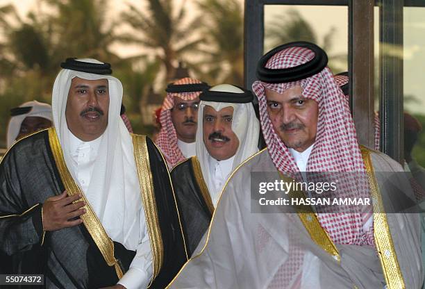 Saudi Foreign Minister Prince Saud al-Faisal receives his Qatari counterpart Sheikh Hamad bin Jassem bin Jabr al-Thani and Abdulrahman al-Attiyah,...