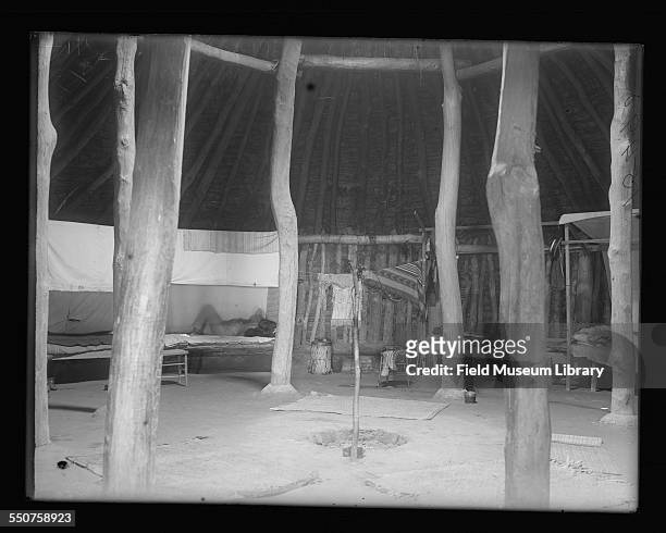 Interior of Native American Pawnee Earth Lodge or house at the Louisiana Purchase Exposition, St Louis, Missouri, June 6, 1904. Exhibit display. In...