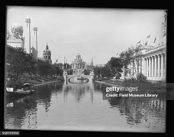 View of the Louisiana Purchase Exposition grounds with various buildings, bridge, lagoon, and columns at the Louisiana Purchase Exposition, St Louis,...