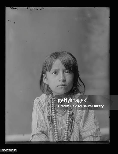 Portrait of a young unidentified Native American child at the Louisiana Purchase Exposition, St Louis, Missouri, June 6, 1904.