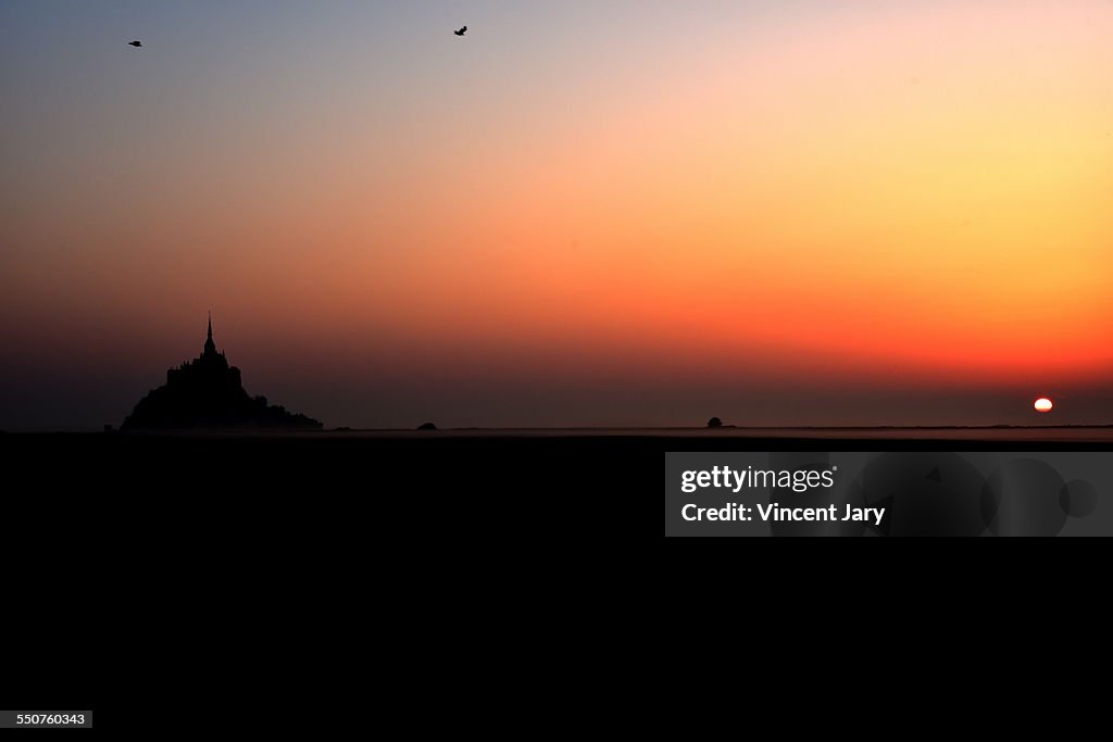 Landscape with sunrise on mont saint michel