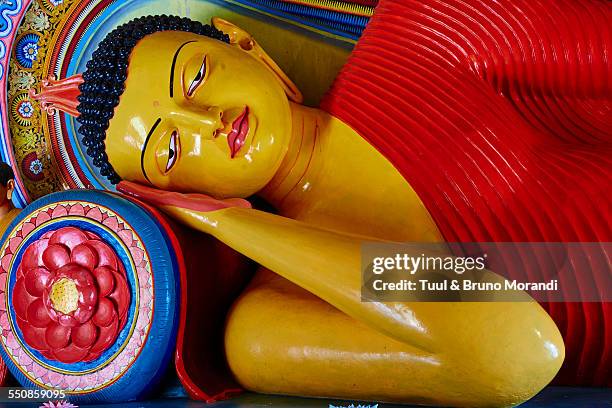 sri lanka, anuradhapura, isurumuniya vihara temple - reclining buddha statue stock pictures, royalty-free photos & images