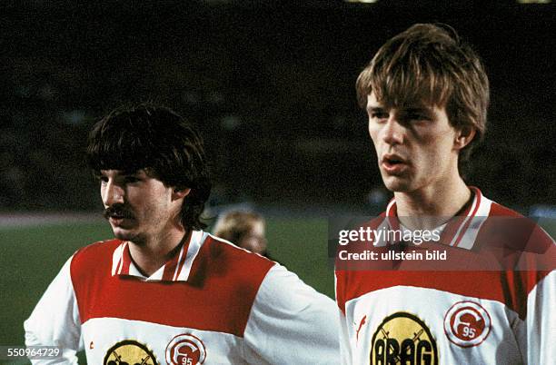 Football, Bundesliga, 1982/1983, Rhine Stadium, Fortuna Duesseldorf versus FC Bayern Munich 3:5, end of the game, leaving, Ralf Dusend left and...