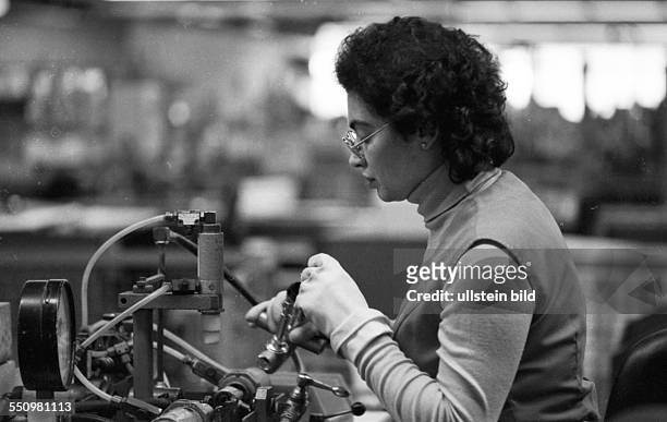Germany, Menden: The production of tapwares and plumbing fixtures at Grohe company, factory with a high proportion of female employees, production at...