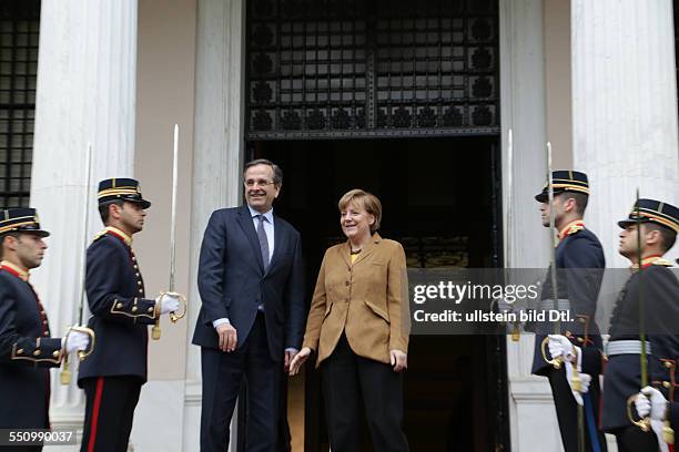 Exactly one day after her 14 year old anniversary as CDU chairwoman the Chancellor of Germany visited Greece one day after the return of the country...