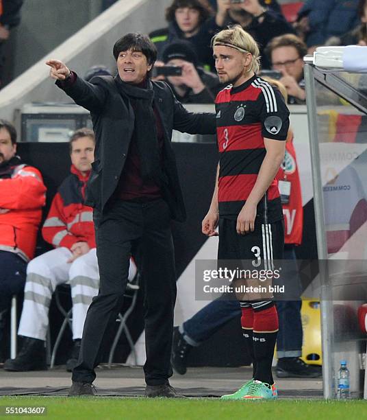 Fussball Laenderspiel 2014, Deutschland - Chile 1-0, Bundestrainer Joachim Loew , li., mit Marcel Schmelzer